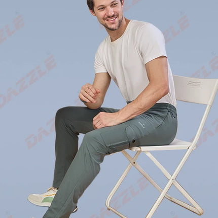 Man sitting on a chair against a light blue background with 'Gazelle' branding.